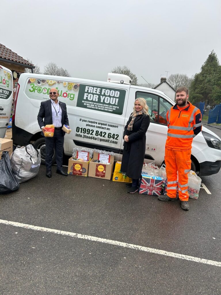 Camfaud giving a Food Bank Donation