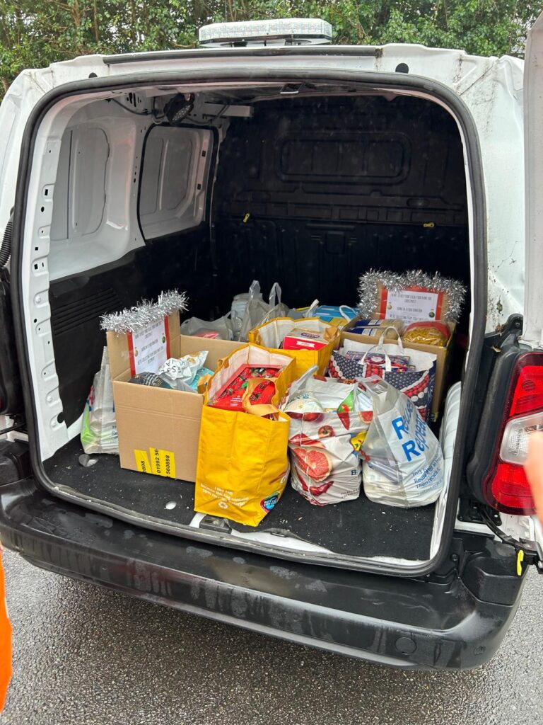 Camfaud loading a van full of Food Bank Donations for Christmas 2024