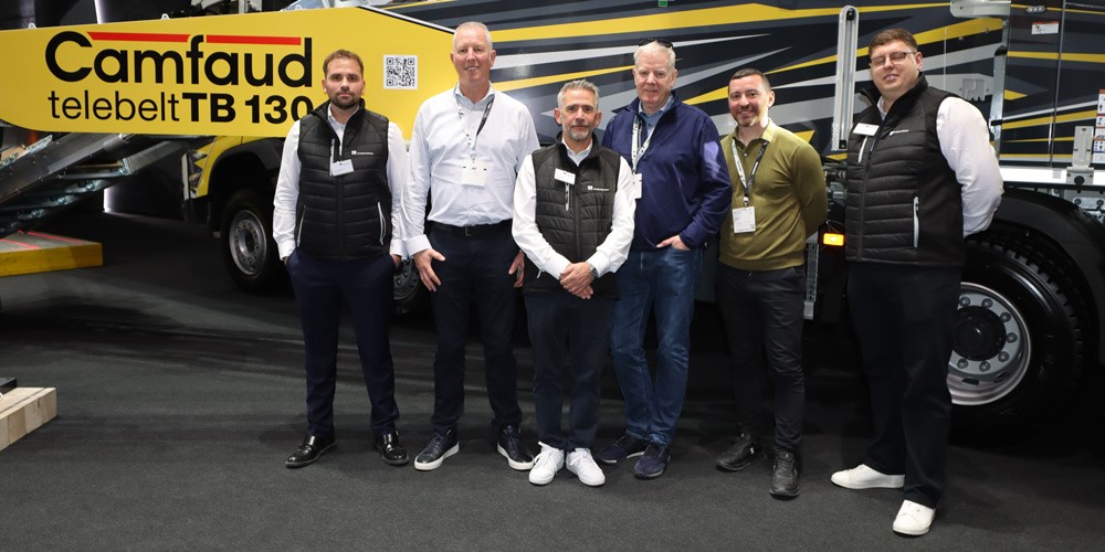 The Camfaud Team stood in front of the Telebelt Tb 130 Concrete Conveyor at bauma 2025